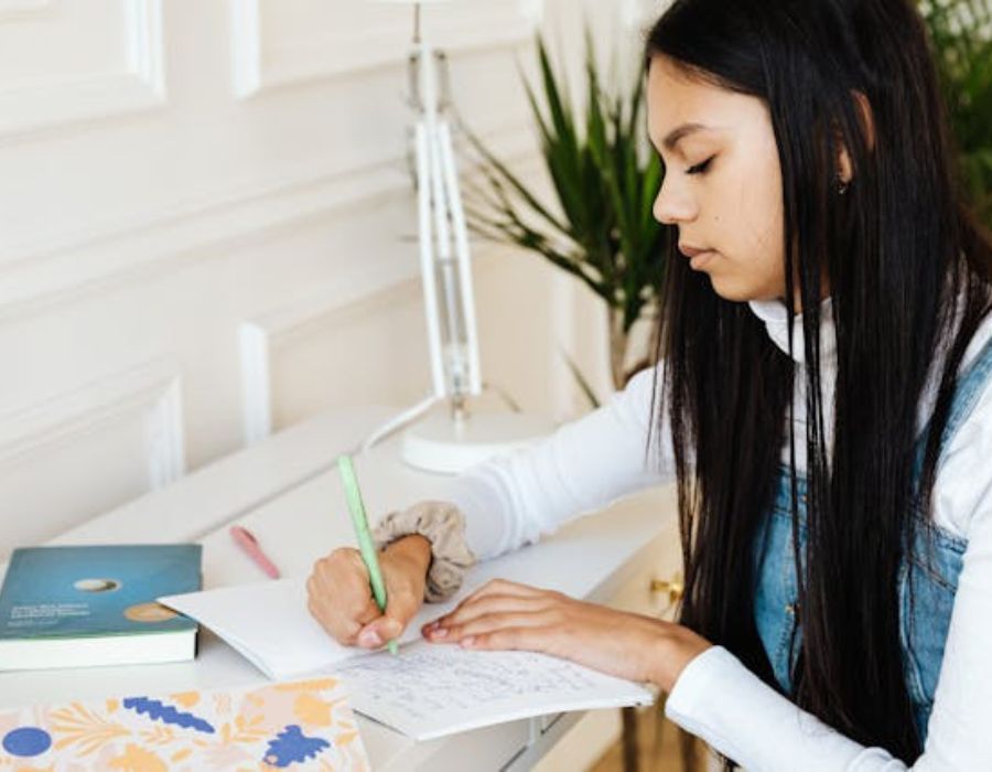a girl writing a eulogy