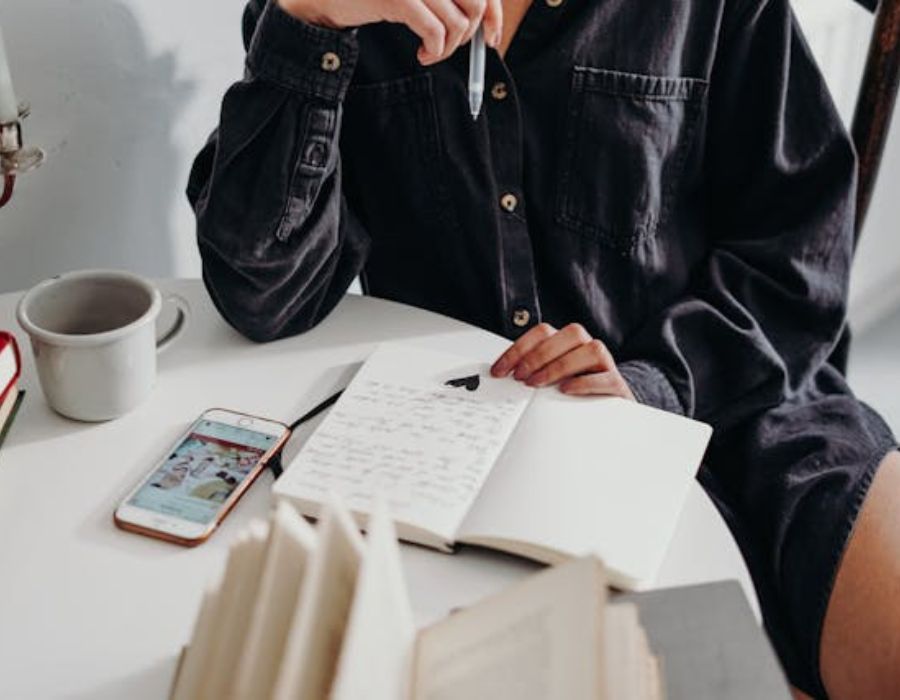 a woman writing a love letter