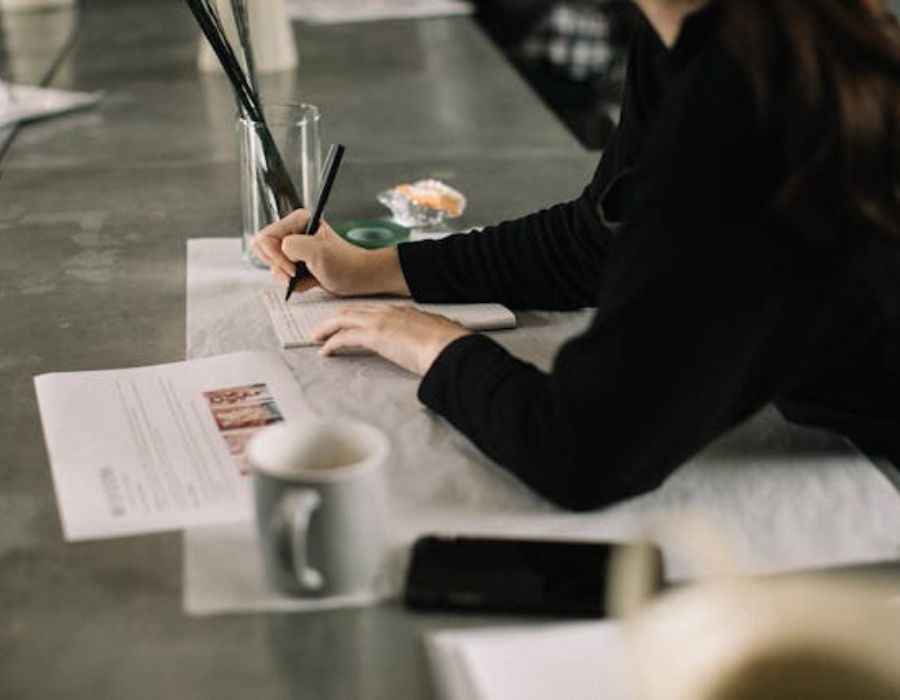 a woman taking some notes