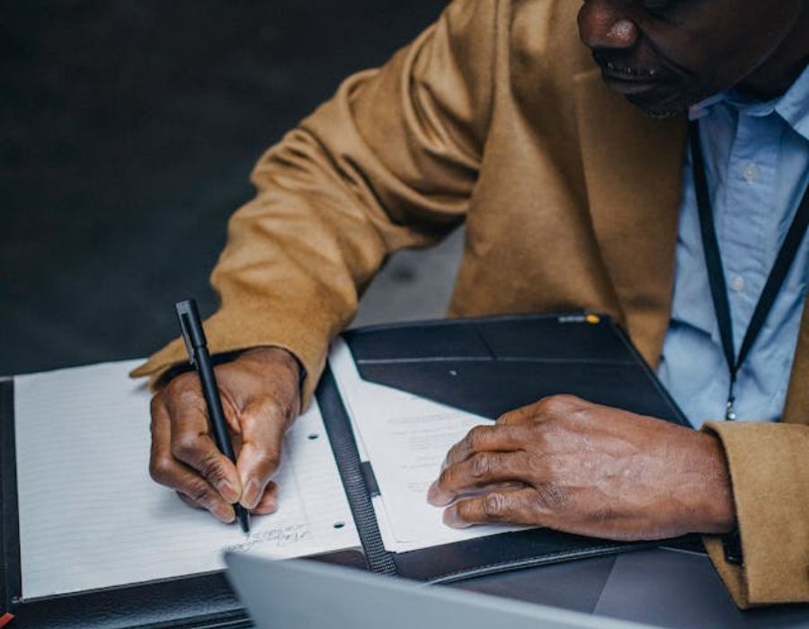 a man noting down something